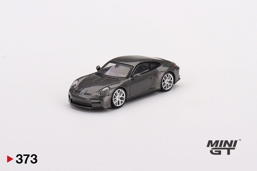 Foto 3 MINI GT Scala 1/64 Porsche 911 (992) GT3 Touring Agate Grey Metallic