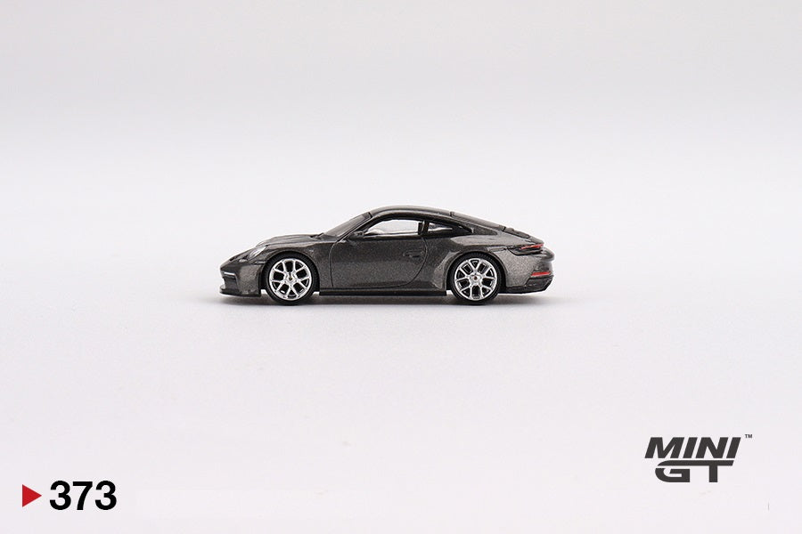 Foto 4 MINI GT Scala 1/64 Porsche 911 (992) GT3 Touring Agate Grey Metallic