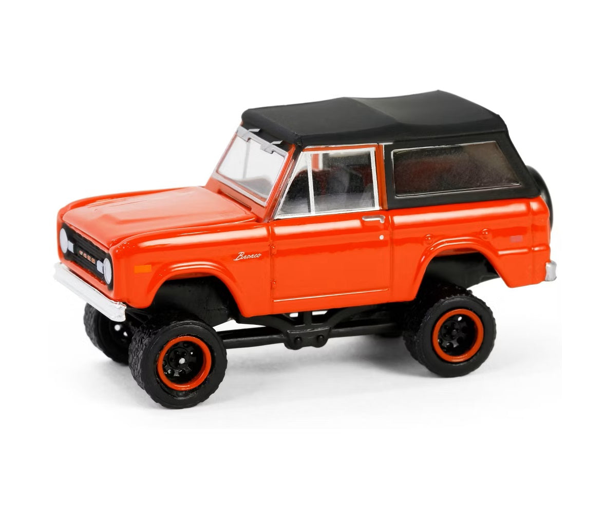 Greenlight - 1969 Ford Bronco Poppy Red - Series All Terrain - Scala 1/64