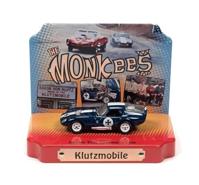 Johnny Lightning - The Monkees Shelby Daytona Cobra The Klutzmobile with Tin display - Scala 1/64 JLDR018