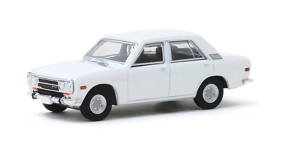 Greenlight - 1972 Datsun 510 4-Door Sedan White Tokyo Torque Serie 8 - Scala 1/64