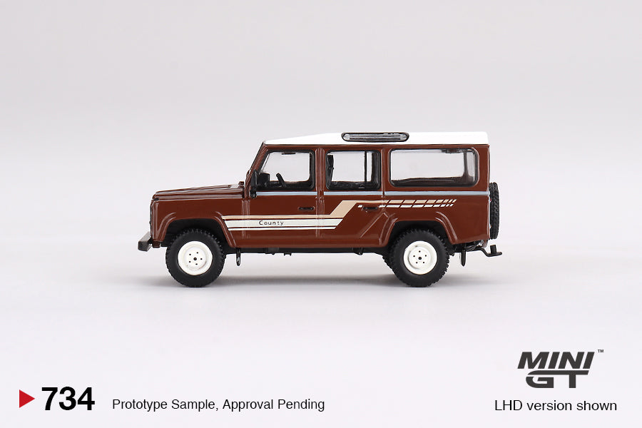 Mini GT - Land Rover Defender 110 1985 County Station Wagon Russet Brown - Scala 1/64 MGT00734-L