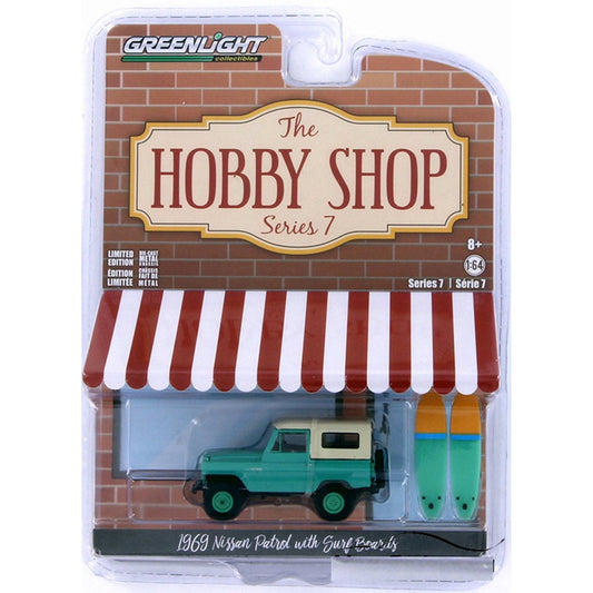 Greenlight - 1969 Nissan Patrol with Surfboards - Series Hobby Shop - Scala 1/64