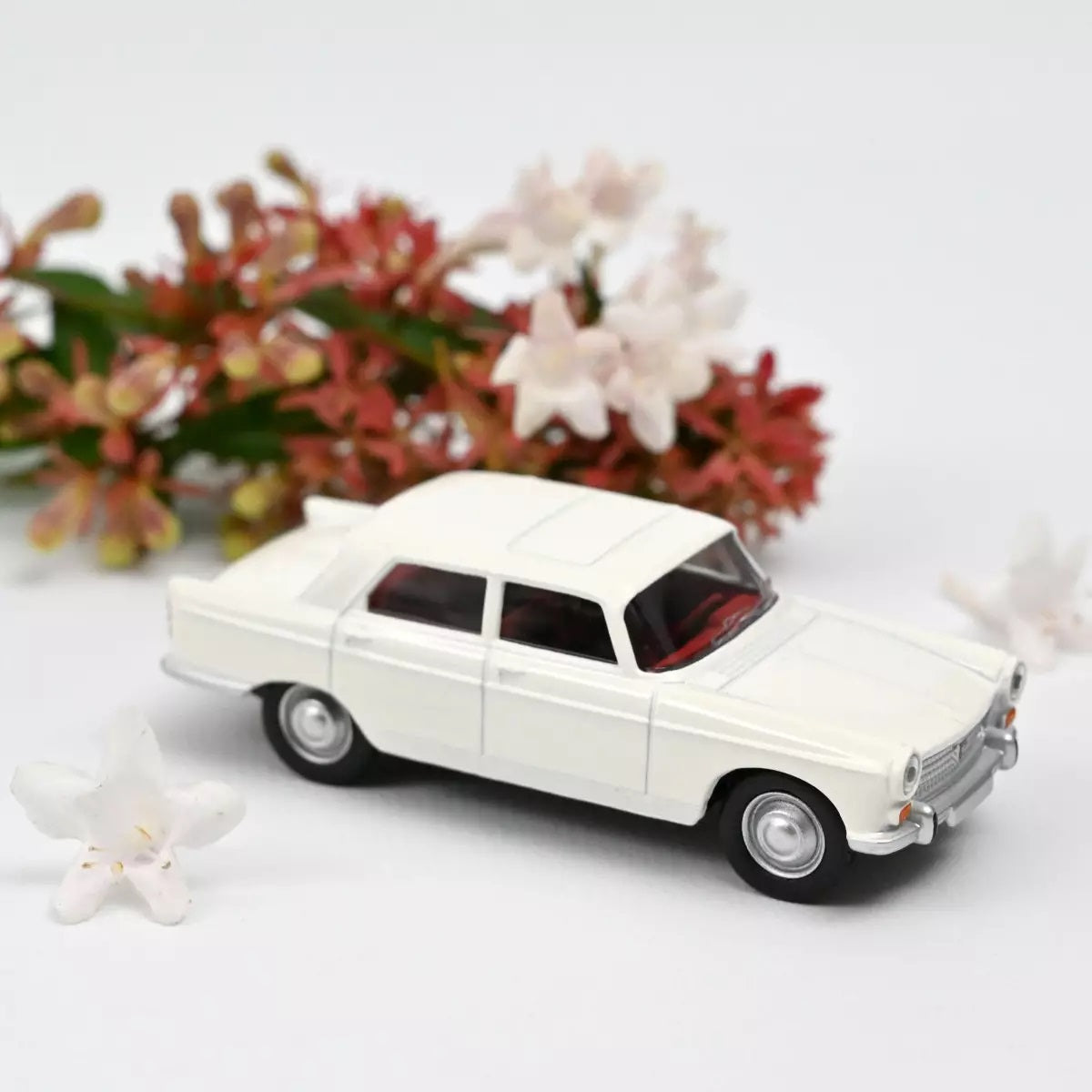 Norev - Peugeot 404 1961 Courchevel white - Scale 1/64 Approximately